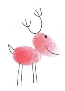 two pink animals standing next to each other on top of a white surface and one is drawn with colored crayons