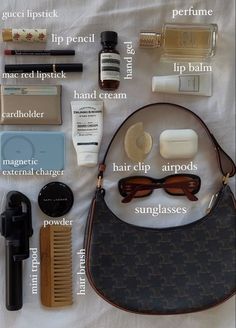 an assortment of personal care items laid out on a bed with the names of them