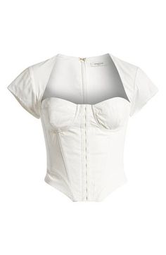 Fall for the corseted silhouette of this date night–ready top designed with a sweetheart neck and abbreviated sleeves. Back zip closure Sweetheart neck Short sleeves 100% cotton with 65% polyester, 32% cotton, 3% elastane contrast Dry clean Imported Fitted Tops With Boned Bodice For Night Out, Fitted Top With Boned Bodice For Spring, White Underbust Top With Boned Bodice, White Cropped Top With Boned Bodice, Fitted Top With Corset Back And Square Neck, Chic Fitted Top With Sweetheart Neckline, Fitted Tops With Boned Bodice For Spring, Chic Underbust Top With Boned Bodice, Chic Fitted Tops With Sweetheart Neckline