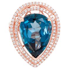 This amazing ring features a large, pear-cut, dark blue topaz (13.38 cts.) with surrounding double border of diamonds ( 0.89 ct.). The ring measures apx. 1-1/16 inches in length and apx. 13/16-inch at the widest. Ring is a size 6-3/4. Total weight is 9.4 grams. Rose Gold Cocktail, Stone Ring Design, White Diamond Jewelry, Marquise Cut Diamond Ring, Sapphire Cocktail Ring, Silver Turquoise Jewelry, Vintage Cocktail Ring, Gem Diamonds, Gold Cocktail Ring