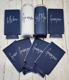 six personalized wedding guest book covers in blue and white with the names of their guests