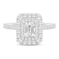 an emerald - cut diamond ring with pave set shoulders