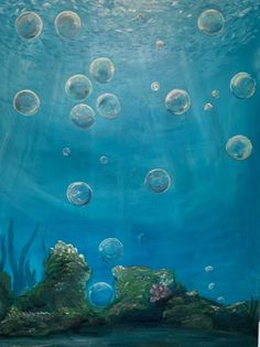 an underwater scene with bubbles floating in the water