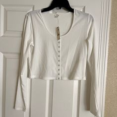 White Crop Henley Style Long Sleeve T Shirt With Snaps From Garage Size Large Basic White Tops For Day Out, Casual White Long Sleeve Top For Spring, Silver Crop Top, Stretchy Crop Tops, Off The Shoulder Tee, Peplum Crop Top, Garage Clothing, Black Cami Top, Garage Tops