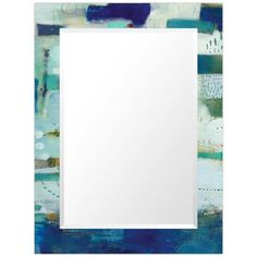 an abstract painting with blue and green colors on the frame, in front of a white square