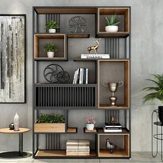 a living room filled with lots of furniture and plants on top of bookshelves