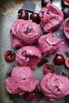 cherries and ice cream on a baking sheet