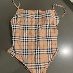 Worn Once For 30 Mins For Photoshoot Great Condition Did Not Wear In Water Purchased In Vegas At Caesars Burberry Authentic Great Steal Burberry Swim, In Water, Womens Swim, One Piece Swimsuit, Burberry, One Piece, Water, Women Shopping, How To Wear