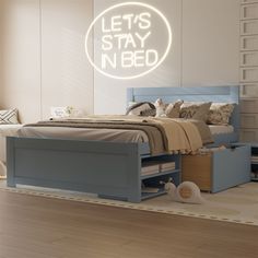 there is a bed with drawers underneath it and a neon sign above the bed that says let's stay nbed