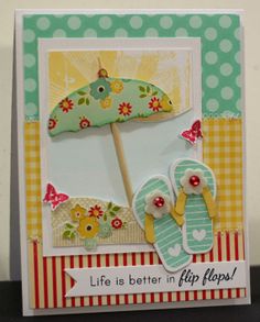 a close up of a card with an umbrella and flip flops