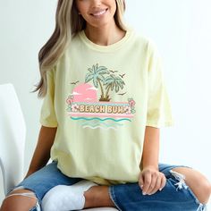 Looking for a cute versatile top to wear? Make sure to grab one of our Graphic tees! This soft and comfortable graphic tee is the perfect top for any outfit. It can be paired with biker shorts, jeans, or even a simple skirt/dress! This tee is true-to-size, so be sure to order your regular t-shirt size! If you are looking for a more oversized look, make sure to size up! Simple Skirt, Woman Beach, Shorts Jeans, Beach Bum, Skirt Dress, Biker Shorts, Striped Shorts, Dress Skirt, Fitness Fashion