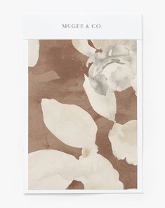 a book with white flowers on it and the title'mcgeee & co '