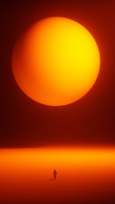 a person standing in the middle of an orange and red light filled area with a large object