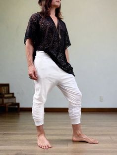 White cotton glorka jogger style pants are finally here! The slight dropcrotch design, not so low as the original glorkas, yet loose enough to enjoy lounging around as well as working out and working at home. Perfect work-leisure attire, great yoga pants option, and a wonderful casual look (maybe a bit on a chic side;) STYLING TIP: Pull them up to the knees, adjust the length you want, add the boots - and rock them at any festival! Try them with sandals or bare foot - and, hey, it’s your go-to yoga/sound bath/meditation outfit! -Unisex-Stretch-Flowing relaxed fit-Inner drawstring to secure the waist-2 side pocketsMaterials: black cotton blend (95% cotton 5% lycra).Fabric for this pair were bought in Fashion District, LA and the pant was made in one of our studios in Brooklyn, NY. Measureme Relaxed Fit Drop Crotch Loungewear Pants, Tapered Leg Cotton Sweatpants For Yoga, Cotton Tapered Leg Sweatpants For Yoga, Relaxed Fit Cotton Joggers For Yoga, Baggy Cotton Sweatpants For Yoga, Relaxed Fit Cotton Sweatpants With Drop Crotch, Sound Bath Meditation, Bath Meditation, Meditation Outfit