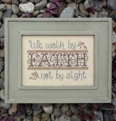 a cross - stitch pattern with the words, life was worth by faith and not by sight