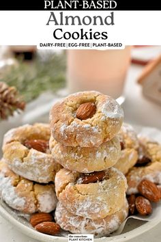 a plate full of almond - based cookies on top of a table