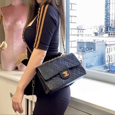 Chanel 24K Gold Classic Flap medium size X89453 Product Details Size: W25 x H16 x D6.5 CM Color：black Accessory: dust bag, card Condition: very good Sub-category: Shoulder bag&Crossbody bag Please Note: All products in our store are second-hand and vintage. ITEM LOCATION IS CANADA. Duties are set by the destination country/province's customs authorities. We are not responsible for paying any duties. These are the actual photos of the item. This item was cared for by a previous owner. Due to its High-end Double Flap Shoulder Bag For Shopping, High-end Double Flap Bag For Shopping, Designer Double Flap Shoulder Bag With Top Carry Handle, Double Flap Shoulder Bag With Dust Bag For Travel, Travel Double Flap Shoulder Bag With Dust Bag, Designer Double Flap Bag For Shopping, Classic Business Flap Bag With Dust Bag, High-end Travel Shoulder Bag With Cc Turnlock Closure, Elegant Double Flap Shoulder Bag For Shopping