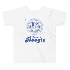 This groovy "Born to Boogie" kids' tee, where the spirit of disco meets playful style! Featuring a dazzling disco ball graphic and the spirited phrase "Born to Boogie," this tee is all about spreading joy and good vibes. Crafted from soft, breathable 100% cotton, it ensures your little one stays comfortable whether they're hitting the dance floor or simply having fun with friends. Perfect for parties, playdates, or just adding a touch of sparkle to their everyday look, this tee is sure to become a favorite in their wardrobe. Let your child shine and show off their love for dancing with our "Born to Boogie" tee - the ultimate statement piece for any young disco diva! * 100% combed and ring-spun cotton * Fabric weight: 4.2 oz/yd² (142 g/m²) * Relaxed fit for extra comfort * Side-seamed const Disco Ball Graphic, Having Fun With Friends, Disco Diva, Fun With Friends, Playful Style, Dance Party, May 7, Disco Ball, The Dance