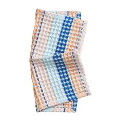 two towels folded on top of each other in different colors and patterns, one is orange, the other blue