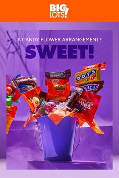 a candy flower arrangement in a purple bucket with the words sweet on it and an orange background