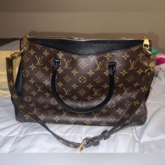 Hasn’t Been Used Very Much And I’ve Kept It In Fairly New Condition. Black Monogram Canvas Satchel With Removable Pouch, Black Monogram Canvas Satchel With Gold-tone Hardware, Black Monogram Canvas Shoulder Bag With Handle Drop, Black Monogram Canvas Satchel, Louis Vuitton Pallas, Red Trench Coat, Bags Louis Vuitton, Crochet Halter Tops, Louis Vuitton Damier Ebene