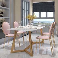 a dining room table with pink chairs around it