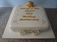 a 50th wedding anniversary cake on a table