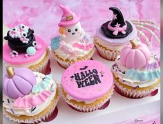 there are many cupcakes that have been decorated to look like witches