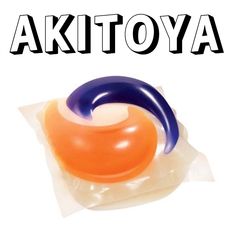 an orange and blue object sitting on top of a plastic bag that says akitooya