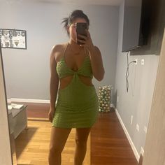 Never Worn Green Cutout Mini Dress For Night Out, Chic Green Mini Dress With Cutout, Green Cutout Mini Dress For Spring, Spring Green Mini Dress With Cutout, Green Cutout Mini Dress For Party, Green Cutout Dress For Day Out, Flirty Cutout Mini Dress For Spring, Casual Cutout Dress For Party, Green Cutout Spring Dress