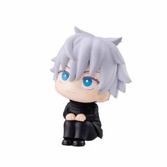 an anime figurine with blue eyes and grey hair sitting on top of a white surface