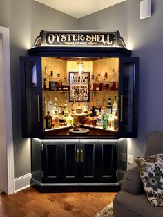 an old fashioned bar with liquor bottles in it