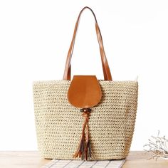 Buy Beige Woven Beach Tote Bag with Tassels Worldwide Free shipping and return, color: Beige , material: Paper Straw Beach Tote, Summer Handbags, Straw Tote Bag, Beige Bag, Straw Handbags, Rattan Bag, Woven Tote Bag, Straw Bags, Straw Tote