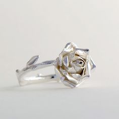 Sterling Silver Rose Ring, Handmade Silver Ring, Women Flower Ring This beautiful, delicate open rose ring would make a stunning statement piece. The band resembles the delicate stem of the rose and every ring is individually handmade so that no two pieces are exactly the same! This makes a truly special gift for yourself or a loved one. * Ring band Material: Sterling Silver * Size of Rose: Approx 1.5 cm (0.59in) diameter 0.6 cm (0.23 in) height * Ready to Ship in 2-4 business day * Made in the Rose Design Flower Ring For Anniversary, Elegant Adjustable Rose-colored Ring, Elegant Rose Gold Flower Ring With Roses, Rose Gold Sterling Silver Open Flower Ring, Dainty Rose Colored Rings As Gift, Rose Gold Open Flower Ring For Wedding, Elegant Rose Flower Ring For Anniversary, Elegant Silver Rings With Rose Details, Rose Gold Sterling Silver Flower Rings