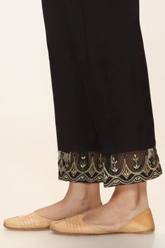 Black Self Latest Pakistani Pant Discover Timeless Style: Limited Edition Black Self Trouser in Black Cambric | Rangreza latest pakistani fashion Elevate your style with our Black Self Trouser. Tailored from black-colored Cambric, this one-piece wonder ensures a perfect fit. Hurry, limited stock available - shop now! Elegant Bottoms With Dupatta For Eid, Bollywood Style Bottoms For Eid Party, Bollywood Style Party Bottoms For Eid, Traditional Pants With Dupatta For Party, Party Pants With Dupatta For Eid, Eid Straight Pants With Dupatta, Elegant Pants With Dabka For Festive Occasions, Elegant Festive Bottoms With Dabka Details, Elegant Festive Bottoms With Dabka