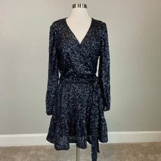 Blue Sequined Dress Womens Size 8 Long Sleeved Fit & Flare Cocktail Party Bling Shine Bright Like A Diamond In This Captivating Blue Sequined Dress - Your Ticket To Turning Heads And Stealing The Spotlight At Any Cocktail Party Or Special Event. Key Features/Benefits: -Long Sleeves For Elegant Coverage -Fit & Flare Silhouette Flatters Your Figure -Shimmering Sequins For Head-Turning Glamour -Size 8 For A Perfect, Comfortable Fit Blue V-neck Holiday Mini Dress, Blue Sequined Dresses For Holiday Party, Blue Sequin Dress For Holiday Party, Blue Dressy Party Dress, Blue Sequin Party Dress For Spring, Blue Summer Dresses For Holiday Party, Blue Summer Dress For Holiday Party, Blue Dress For Summer Holiday Party, Blue Long Sleeve Mini Dress For Holiday