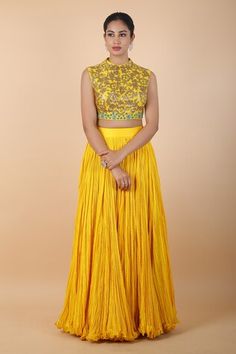 Yellow blouse with metallic sequin and contrasting French knots embroidery. Comes with crushed lehenga and floral bordered dupatta. - Aza Fashions Yellow Embellished Choli For Eid, Eid Yellow Embellished Choli, Eid Embellished Yellow Choli, Yellow Embellished Palazzo Set For Weddings, Fitted Embellished Palazzo Set For Navratri, Yellow Embellished Pre-draped Saree For Reception, Embellished Fitted Chanderi Lehenga, Fitted Palazzo Set With Dori Work For Reception, Fitted Palazzo Set With Mirror Work For Reception