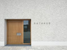 an entrance to a building with the name bathauss on it's side