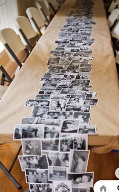 a long table with many pictures on it