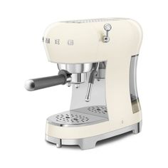 an espresso machine on a white background with no one around it to see the image