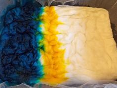 there is a cake that has been made to look like the colors of the rainbow