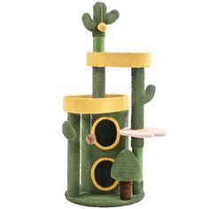 a green cat tree with two cats in it