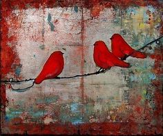 three red birds sitting on a wire with paint