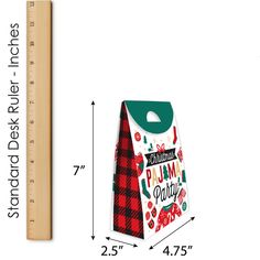 a wooden ruler with a paper bag on it and the measurements for each package are shown