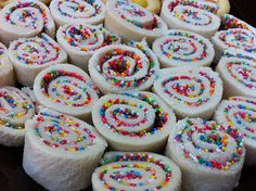 there are many rolls with sprinkles on them