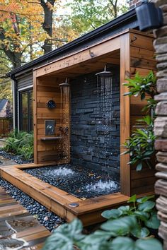 an outdoor shower with water coming out of it