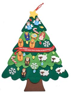 a cardboard christmas tree with animals on it