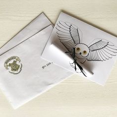 two envelopes with an owl on the front and one has a harry potter sticker on it