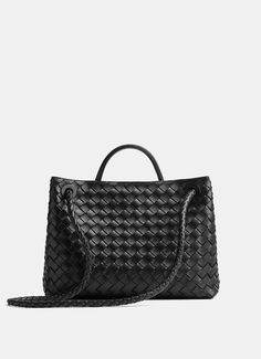 Intrecciato leather bag by Bottega Veneta with single compartment, magnetic closure and metallic top handle crafted by artisans that showcases nuances and engraved markings making each piece unique. Unlined. Made in Italy. Dimensions: 12 x 20 x 2,5 cm approx. Andiamo Bag, Womens Designer Bags, Bottega Veneta Intrecciato, Sneaker Jewelry, Black Shop, Eyewear Womens, Designer Shoulder Bags, Wallet Bag, Medium Bags