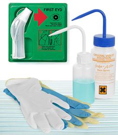 the first aid kit contains gloves, an oxygen tube, and a bottle of mouthwash